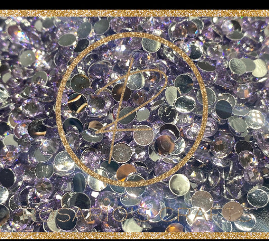 Light amethyst SB rhinestones by the size/scoop