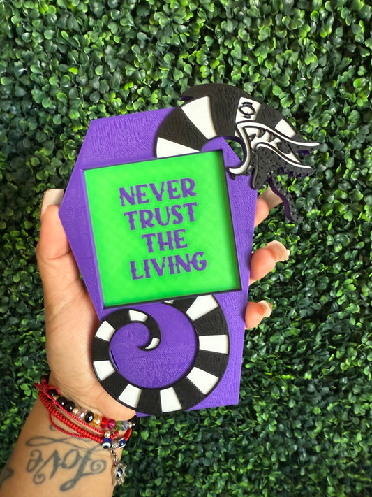 Never trust the living sticky note pad holder